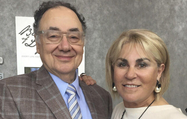 In this Oct. 15, 2017 photo provided by the United Jewish Appeal via Canadian Press, Barry and Honey Sherman pose for a photo in Toronto, Canada. At the conclusion of a six week investigation, police said Friday, Jan. 26, 2018, they believe the Canadian billionaire businessman and his wife were both murdered. (United Jewish Appeal Federation - Greater Toronto/Canadian Press via AP)